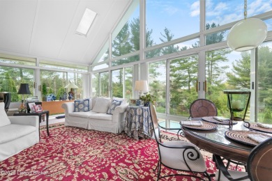 Spacious walk-out ranch offering panoramic views situated on on Hunting Creek Country Club in Kentucky - for sale on GolfHomes.com, golf home, golf lot