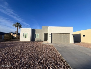 NEWLY COMPLETE CUSTOM HOME, never been occupied! Located on a on Tierra Grande Golf Club in Arizona - for sale on GolfHomes.com, golf home, golf lot