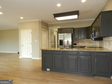 IMPROVEMENTS HAVE BEEN MADE!! Location situated on the golf on Braelinn Golf Club in Georgia - for sale on GolfHomes.com, golf home, golf lot