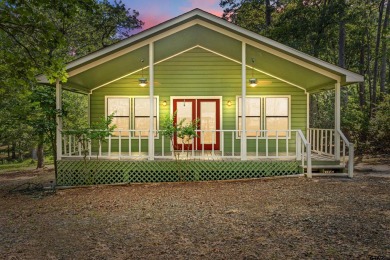 Nestled in the prestigious Holly Lake Ranch subdivision and on Holly Lake Ranch Golf Club in Texas - for sale on GolfHomes.com, golf home, golf lot