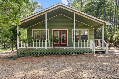 Nestled in the prestigious Holly Lake Ranch subdivision and on Holly Lake Ranch Golf Club in Texas - for sale on GolfHomes.com, golf home, golf lot