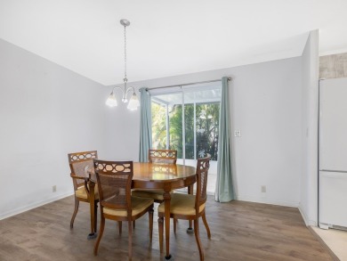 This 2004 2-bed, 2-bath split-plan home is nestled on a quiet on Barefoot Bay Golf Course in Florida - for sale on GolfHomes.com, golf home, golf lot