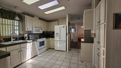 Welcome to your dream home! This beautifully maintained on LaPlaya Golf Club in Florida - for sale on GolfHomes.com, golf home, golf lot