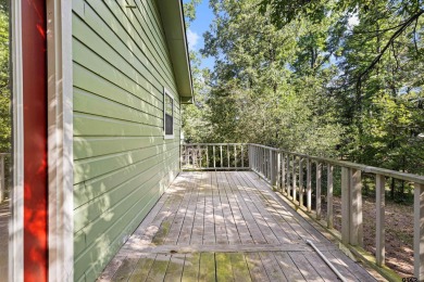 Nestled in the prestigious Holly Lake Ranch subdivision and on Holly Lake Ranch Golf Club in Texas - for sale on GolfHomes.com, golf home, golf lot