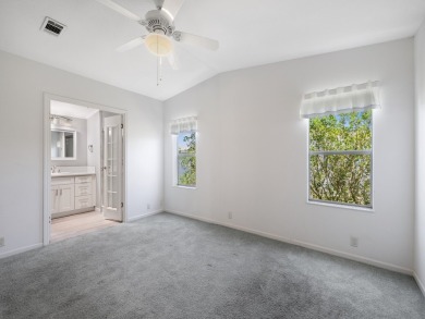 This 2004 2-bed, 2-bath split-plan home is nestled on a quiet on Barefoot Bay Golf Course in Florida - for sale on GolfHomes.com, golf home, golf lot