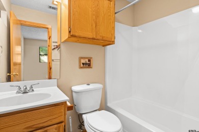 Nestled in the prestigious Holly Lake Ranch subdivision and on Holly Lake Ranch Golf Club in Texas - for sale on GolfHomes.com, golf home, golf lot