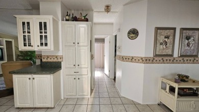 Welcome to your dream home! This beautifully maintained on LaPlaya Golf Club in Florida - for sale on GolfHomes.com, golf home, golf lot