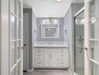 This 2004 2-bed, 2-bath split-plan home is nestled on a quiet on Barefoot Bay Golf Course in Florida - for sale on GolfHomes.com, golf home, golf lot