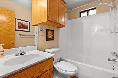 Nestled in the prestigious Holly Lake Ranch subdivision and on Holly Lake Ranch Golf Club in Texas - for sale on GolfHomes.com, golf home, golf lot