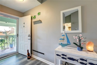 Step into paradise, this stunning 2B/2B luxury condo nestled in on Pelican Pointe 9 Hole Course in Florida - for sale on GolfHomes.com, golf home, golf lot