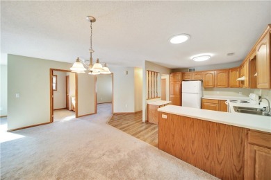 This 2 bed, 2 bath condo with one level living is located right on The Amery Golf Club in Wisconsin - for sale on GolfHomes.com, golf home, golf lot