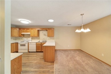 This 2 bed, 2 bath condo with one level living is located right on The Amery Golf Club in Wisconsin - for sale on GolfHomes.com, golf home, golf lot