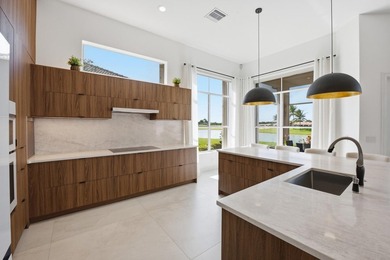 Located on the 11th hole in Aberdeen Golf & Country Club, this on Aberdeen Golf and Country Club in Florida - for sale on GolfHomes.com, golf home, golf lot