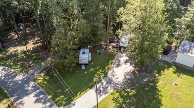 Golf Cart will convey with acceptable offer!! Discover a on River Golf and Country Club at Lake Royale in North Carolina - for sale on GolfHomes.com, golf home, golf lot