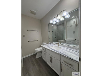 Situated in a gated community with beautiful Resaca views, this on South Padre Island Golf Club in Texas - for sale on GolfHomes.com, golf home, golf lot