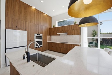 Located on the 11th hole in Aberdeen Golf & Country Club, this on Aberdeen Golf and Country Club in Florida - for sale on GolfHomes.com, golf home, golf lot