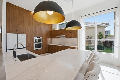 Located on the 11th hole in Aberdeen Golf & Country Club, this on Aberdeen Golf and Country Club in Florida - for sale on GolfHomes.com, golf home, golf lot