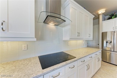 Fall in love with this 2015 built custom waterfront pool home on Saint Andrews South Golf Club in Florida - for sale on GolfHomes.com, golf home, golf lot