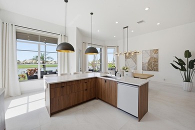 Located on the 11th hole in Aberdeen Golf & Country Club, this on Aberdeen Golf and Country Club in Florida - for sale on GolfHomes.com, golf home, golf lot