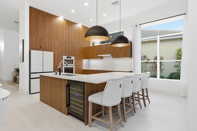 Located on the 11th hole in Aberdeen Golf & Country Club, this on Aberdeen Golf and Country Club in Florida - for sale on GolfHomes.com, golf home, golf lot