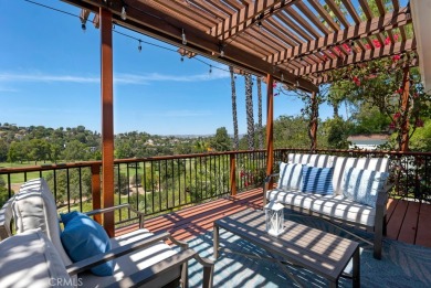 Passing through the hand-crafted wrought iron security gates and on Woodland Hills Country Club in California - for sale on GolfHomes.com, golf home, golf lot