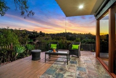 Passing through the hand-crafted wrought iron security gates and on Woodland Hills Country Club in California - for sale on GolfHomes.com, golf home, golf lot