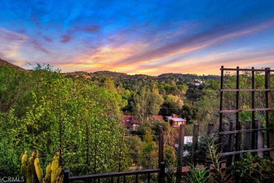 Passing through the hand-crafted wrought iron security gates and on Woodland Hills Country Club in California - for sale on GolfHomes.com, golf home, golf lot