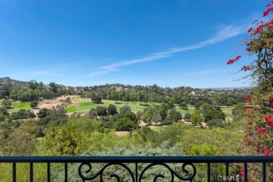 Passing through the hand-crafted wrought iron security gates and on Woodland Hills Country Club in California - for sale on GolfHomes.com, golf home, golf lot