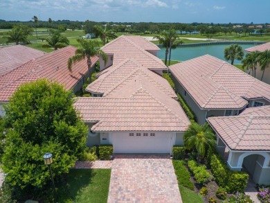 Stunning designer renovation of this two story Victoria Island on Grand Harbor Golf and Country Club in Florida - for sale on GolfHomes.com, golf home, golf lot