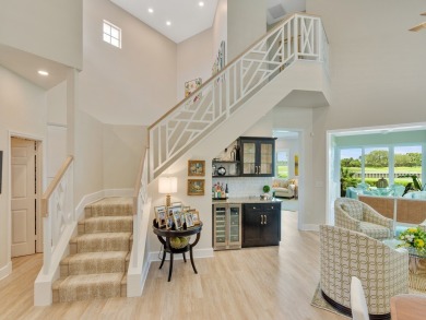 Stunning designer renovation of this two story Victoria Island on Grand Harbor Golf and Country Club in Florida - for sale on GolfHomes.com, golf home, golf lot
