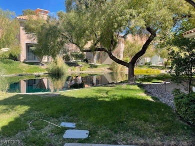 WELL KEPT TOWNHOUSE WITH AWESOME VIEWS OF THE POND IN A GUARD on Spanish Trail Golf and Country Club in Nevada - for sale on GolfHomes.com, golf home, golf lot