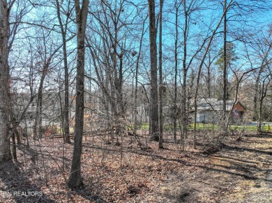 Nestled in the heart of Tellico Village, this stunning lot on Toqua Golf Course - Loudon County in Tennessee - for sale on GolfHomes.com, golf home, golf lot