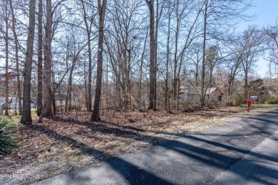 Nestled in the heart of Tellico Village, this stunning lot on Toqua Golf Course - Loudon County in Tennessee - for sale on GolfHomes.com, golf home, golf lot