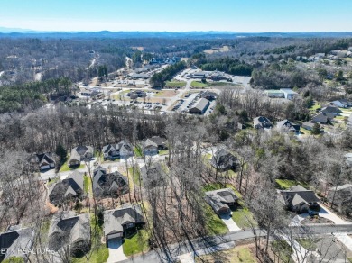 Nestled in the heart of Tellico Village, this stunning lot on Toqua Golf Course - Loudon County in Tennessee - for sale on GolfHomes.com, golf home, golf lot