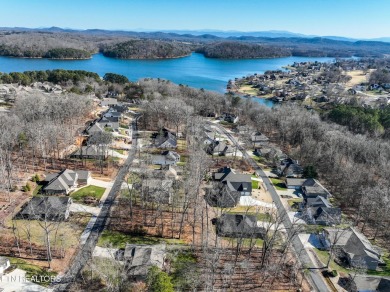 Nestled in the heart of Tellico Village, this stunning lot on Toqua Golf Course - Loudon County in Tennessee - for sale on GolfHomes.com, golf home, golf lot