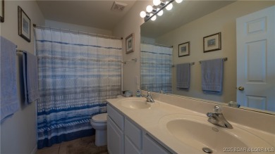 The best value for condo living! Come see the BIG lake views on The Club At Old Kinderhook in Missouri - for sale on GolfHomes.com, golf home, golf lot