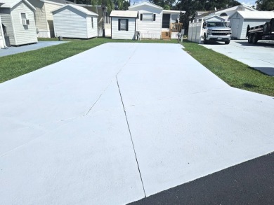 This vacant property, measuring 40' x 69', is located in the on Deer Creek RV Golf Resort in Florida - for sale on GolfHomes.com, golf home, golf lot