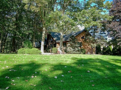 This stunning 3,900 square foot home is nestled on a picturesque on St Clair River Country Club in Michigan - for sale on GolfHomes.com, golf home, golf lot