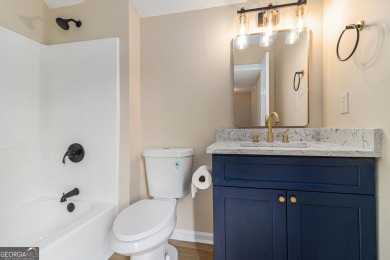 Step into this beautifully updated 3 bedroom, 2 bath on Canongate At Flat Creek Club in Georgia - for sale on GolfHomes.com, golf home, golf lot