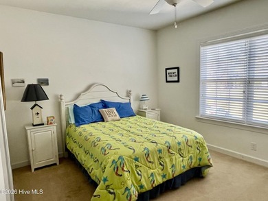 Beautifully decorated and fully furnished second-floor end unit on Sea Trail Golf Resort in North Carolina - for sale on GolfHomes.com, golf home, golf lot