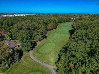 This stunning 3,900 square foot home is nestled on a picturesque on St Clair River Country Club in Michigan - for sale on GolfHomes.com, golf home, golf lot