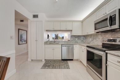 Owners have put a lot of thought and love into  this condo and on Poinciana Golf Club in Florida - for sale on GolfHomes.com, golf home, golf lot