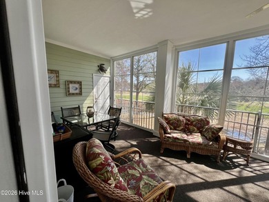 Beautifully decorated and fully furnished second-floor end unit on Sea Trail Golf Resort in North Carolina - for sale on GolfHomes.com, golf home, golf lot