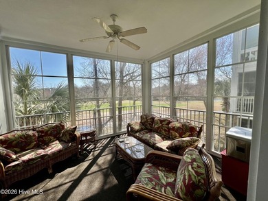 Beautifully decorated and fully furnished second-floor end unit on Sea Trail Golf Resort in North Carolina - for sale on GolfHomes.com, golf home, golf lot