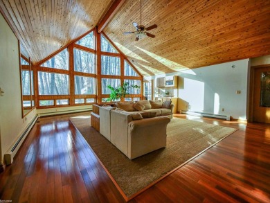 This stunning 3,900 square foot home is nestled on a picturesque on St Clair River Country Club in Michigan - for sale on GolfHomes.com, golf home, golf lot