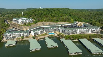 The best value for condo living! Come see the BIG lake views on The Club At Old Kinderhook in Missouri - for sale on GolfHomes.com, golf home, golf lot