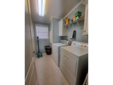 This is A Palm Harbor Double Wide! 1500 SqFt. Absolutely on Riverwood Golf Club in Florida - for sale on GolfHomes.com, golf home, golf lot