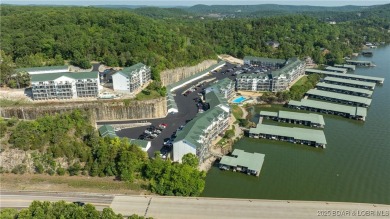 The best value for condo living! Come see the BIG lake views on The Club At Old Kinderhook in Missouri - for sale on GolfHomes.com, golf home, golf lot