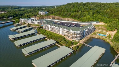 The best value for condo living! Come see the BIG lake views on The Club At Old Kinderhook in Missouri - for sale on GolfHomes.com, golf home, golf lot