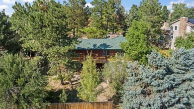 This home features an open concept kitchen that's perfect for on Pinery Golf and Country Club in Colorado - for sale on GolfHomes.com, golf home, golf lot